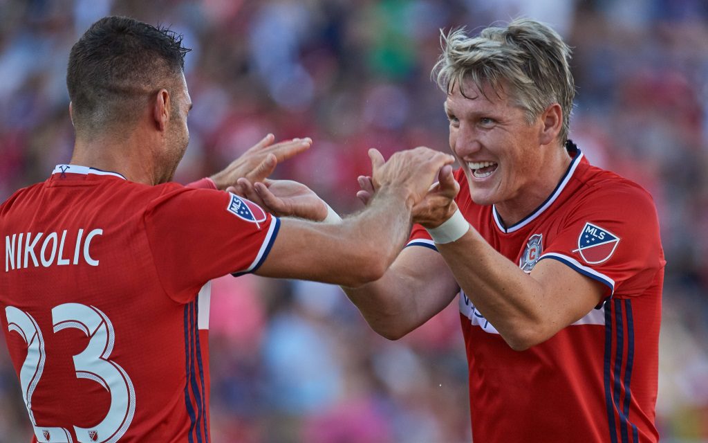 Bastian Schweinsteiger und Nemanja Nikolic freuen sich über ein Tor gegen Vancouver.