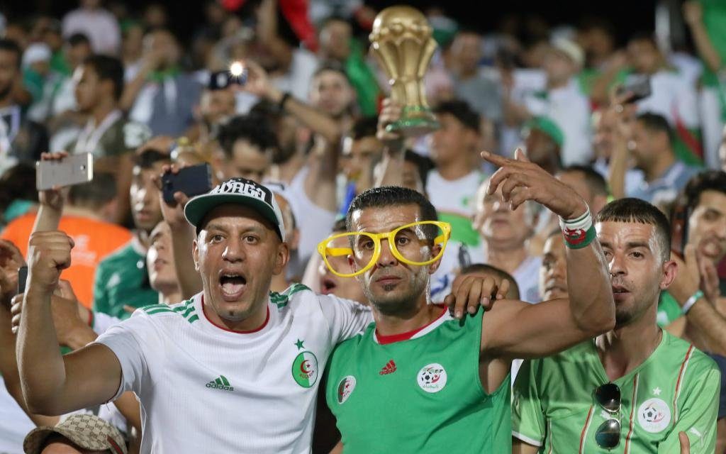 Supporters of the Algeria cheer up the team before the quarterfinal match between Cote d Ivoire and Algeria at the 2019 Africa Cup of Nations in Suez