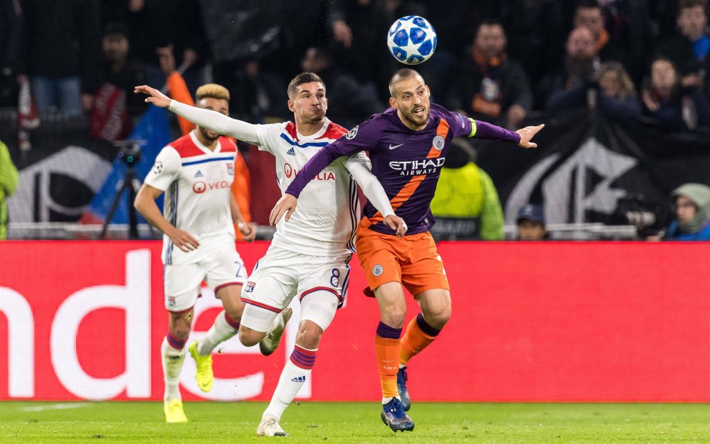 Houssem Aouar of Olympique Lyonnais, David Silva of Manchester City during the UEFA Champions League group F match between Olympique Lyonnais and Manchester City at Stade de Lyon on November 27, 2018 in Decines, France
