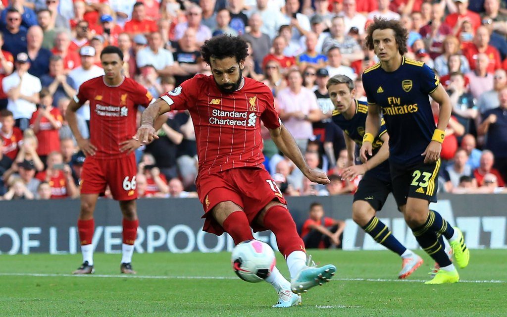 24th August 2019; Anfield, Liverpool, Merseyside, England; English Premier League Football, Liverpool versus Arsenal Football Club; Mohammed Salah of Liverpool beats Arsenal goalkeeper Bernd Leno from the penalty spot after 49 minutes to give his side a 2-0 lead
