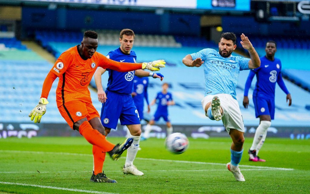 Goalkeeper Edouard Mendy of Chelsea clears the ball under pressure from Sergio Aguero of Manchester City Manchester City v Chelsea, Premier League, Football, The Etihad Stadium, Manchester, UK - 08 May 2021