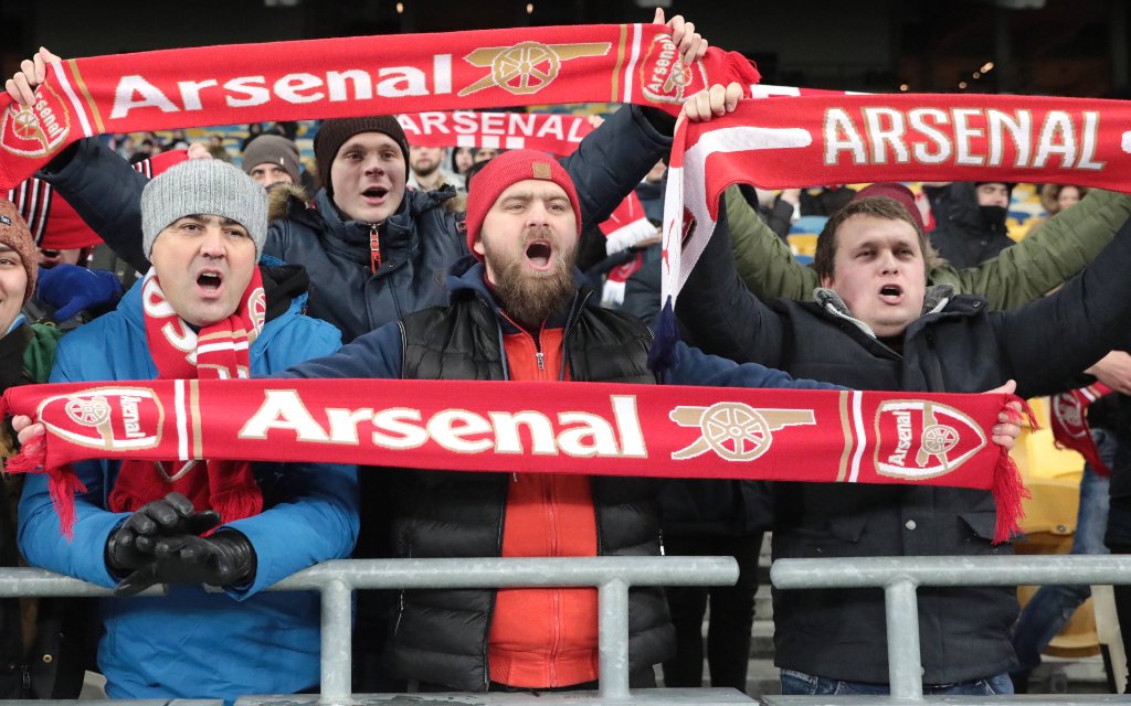 Fans of Arsenal FC take their seats on the stands before the UEFA Europa League Group E Matchday 5 game against FC Vorskla Poltava at the NSC Olimpiyskiy, Kyiv, capital of Ukraine